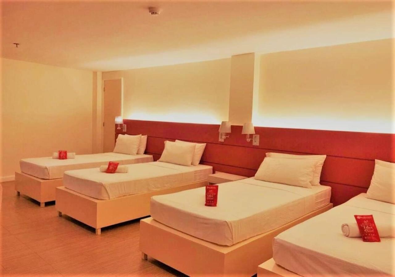 Reddoorz Plus At Hotel Metro Калибо Номер фото