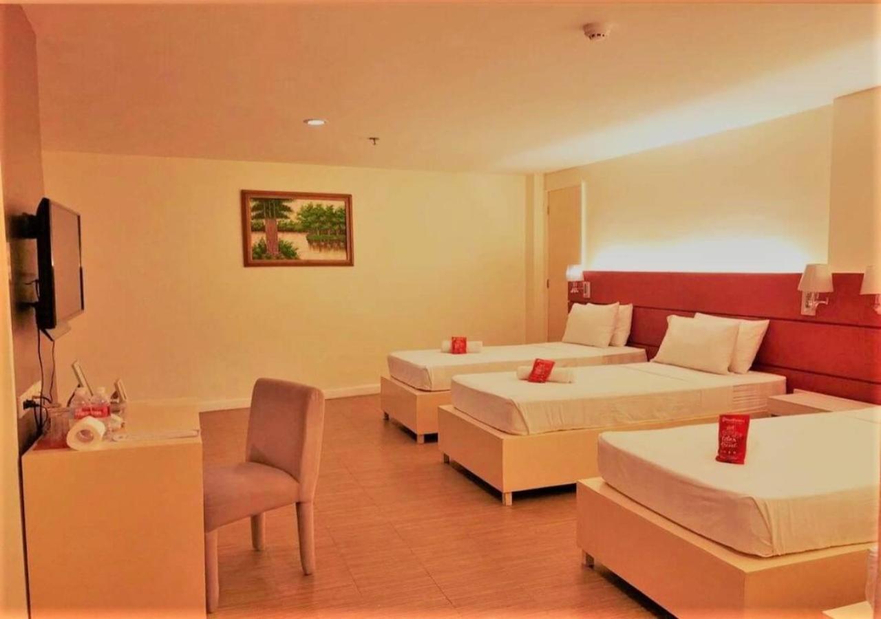 Reddoorz Plus At Hotel Metro Калибо Номер фото