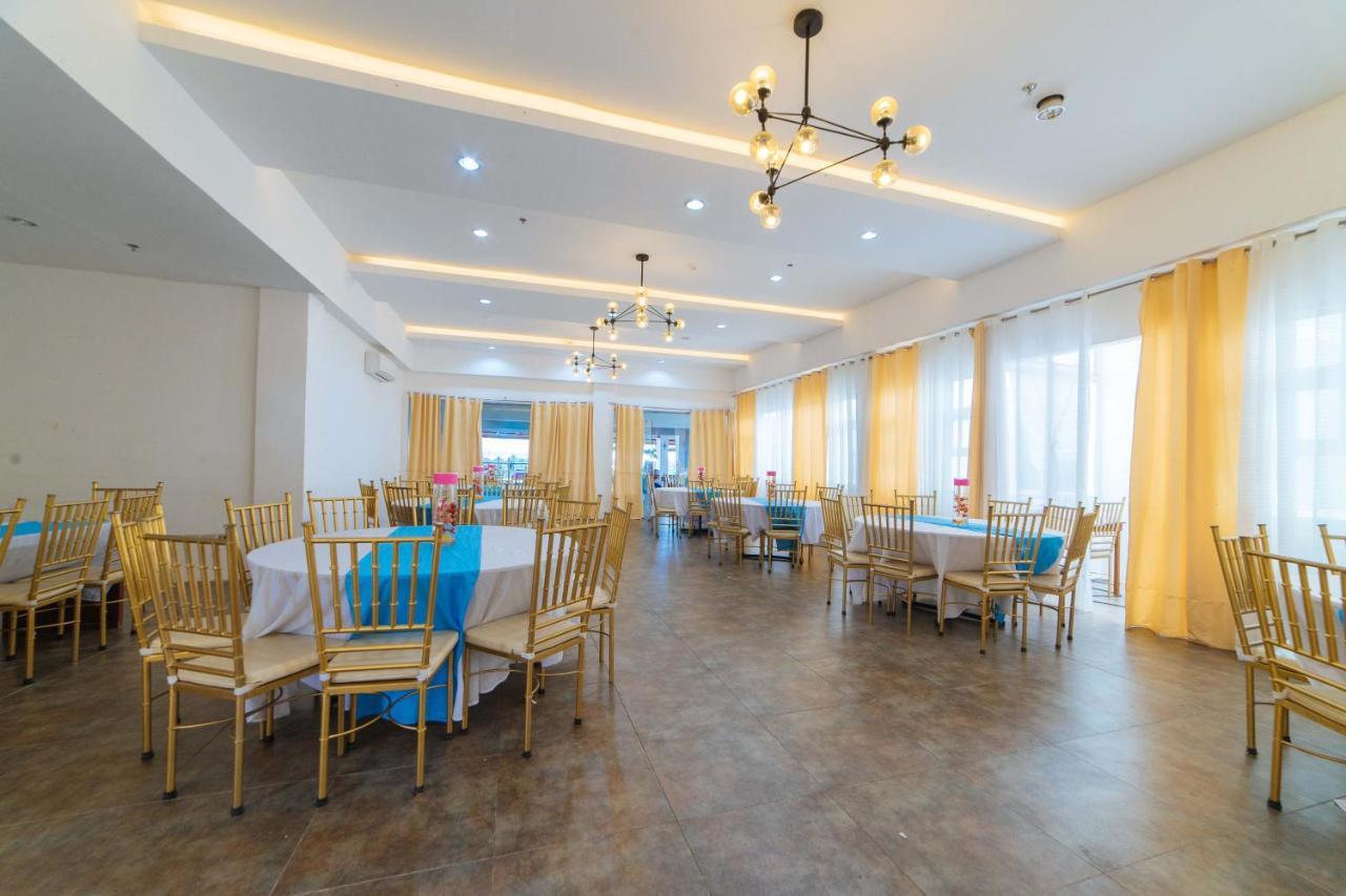Reddoorz Plus At Hotel Metro Калибо Экстерьер фото